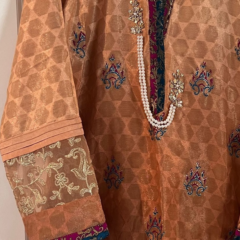 Pakistani designer shalwar suit. Formal, finished edges, silk pants.
